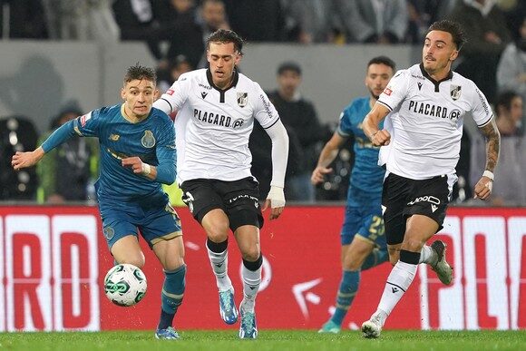 Vitoria de Guimaraes` Joao Mendes (C) fights for the ball with Francisco Conceicao (L) of FC Porto during their Portuguese First League soccer match held at D. Afonso Henriques Stadium in Guimaraes, Portugal, 12th November 2023. HUGO DELGADO/LUSA