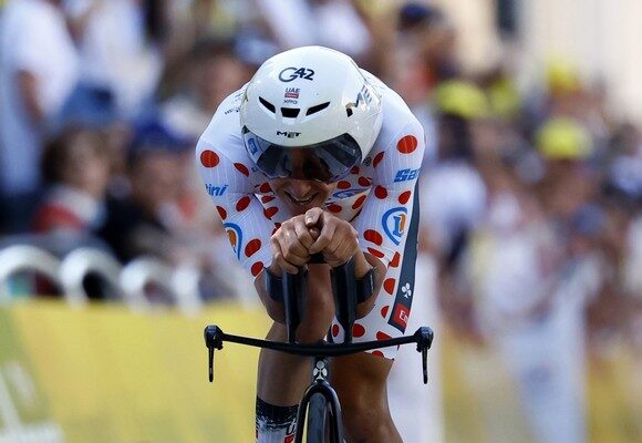 epa12227284 Slovenian rider Tadej Pogacar of UAE Team Emirates, wearing the polka dot best climber jersey, crosses the finish line of the 5th stage of the Tour de France cycling race, an Individual Time Trial over 33km in Caen, France, 09 July 2025.  EPA/MARTIN DIVISEK