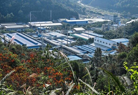 TOPSHOT - A view of a rare earths processing plant is seen in Dingnan County, Ganzhou, in eastern China's Jiangxi province on November 20, 2025. China's stranglehold on the rare earths industry -- from natural reserves and mining through processing and innovation -- is the result of a decades-long drive, now giving Beijing crucial leverage in its trade war with the United States. (Photo by Hector RETAMAL / AFP) / To go with AFP story China-US-technology-diplomacy-mining, YEARENDER by Peter Catterall