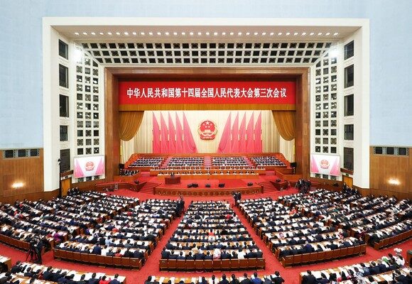 The opening meeting of the third session of the 14th National People's Congress NPC is held at the Great Hall of the People in Beijing, capital of China, March 5, 2025. (Photo by Ding Haitao/Xinhua via Getty Images)