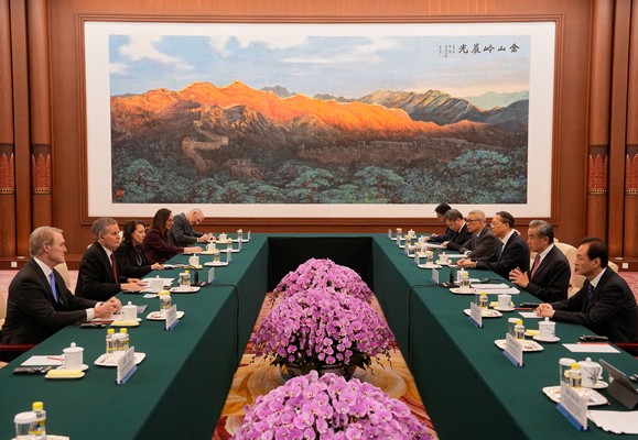 epa12937775 Chinese Foreign Minister Wang Yi, (2-R) talks to US Senator Steve Daines, (2-L) during a bilateral meeting with US congressional delegation at the Great Hall of the People, in Beijing, China, 07 May 2026.  EPA/ANDY WONG / POOL POOL PHOTO